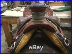 Custom made wade saddle by granite station saddlery full tooled