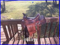 Used 14 Courts Trophy Roping Saddle, tooled, roughout jockey, CJRA