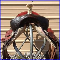 Used 15 black / red leather Western barrel race saddle good condition