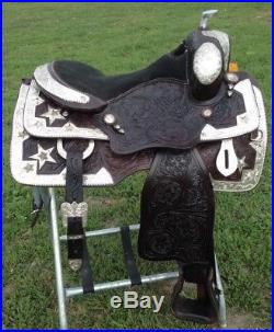 Used 16.5 Western show saddle tooled dark oil leather withlots of silver