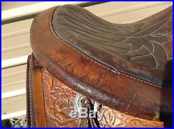 Used Simco 15.5 tooled Western trail / pleasure saddle withsilver conchos US made